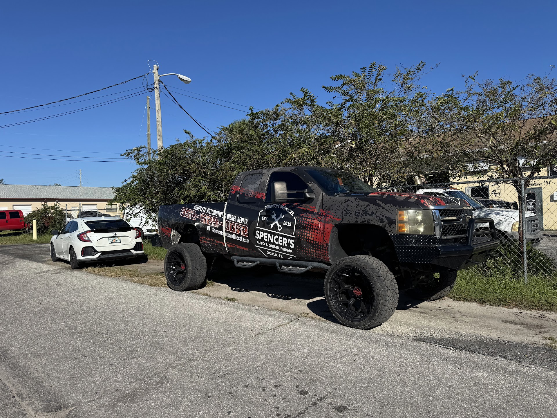 Leveled diesel pickup at Spencer's Auto & Diesel in Ocala, FL